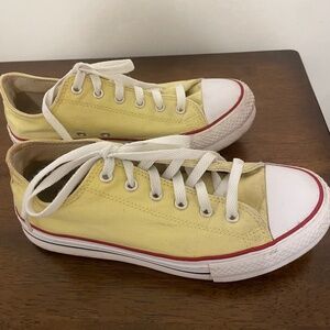 Yellow Converse low-tops